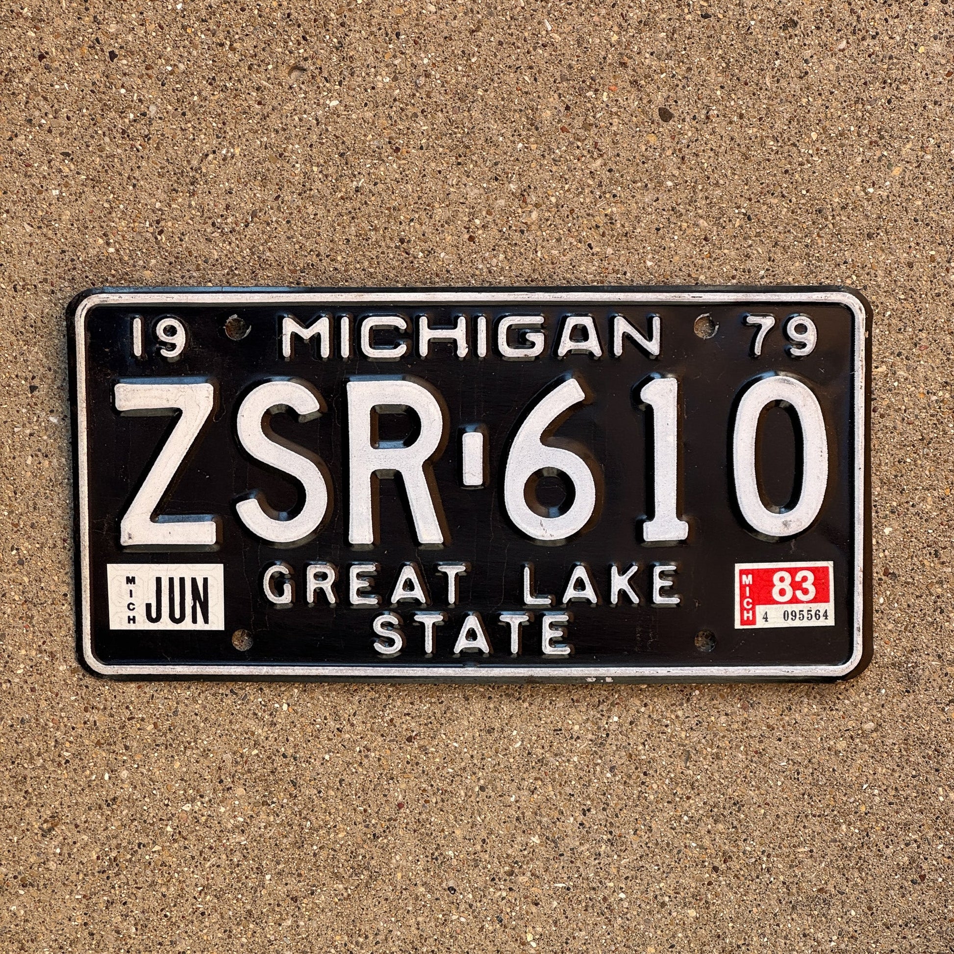 Photo of a 1979 1983 Michigan License Plate Auto Tag Garage Decor Vintage ZSR 610
