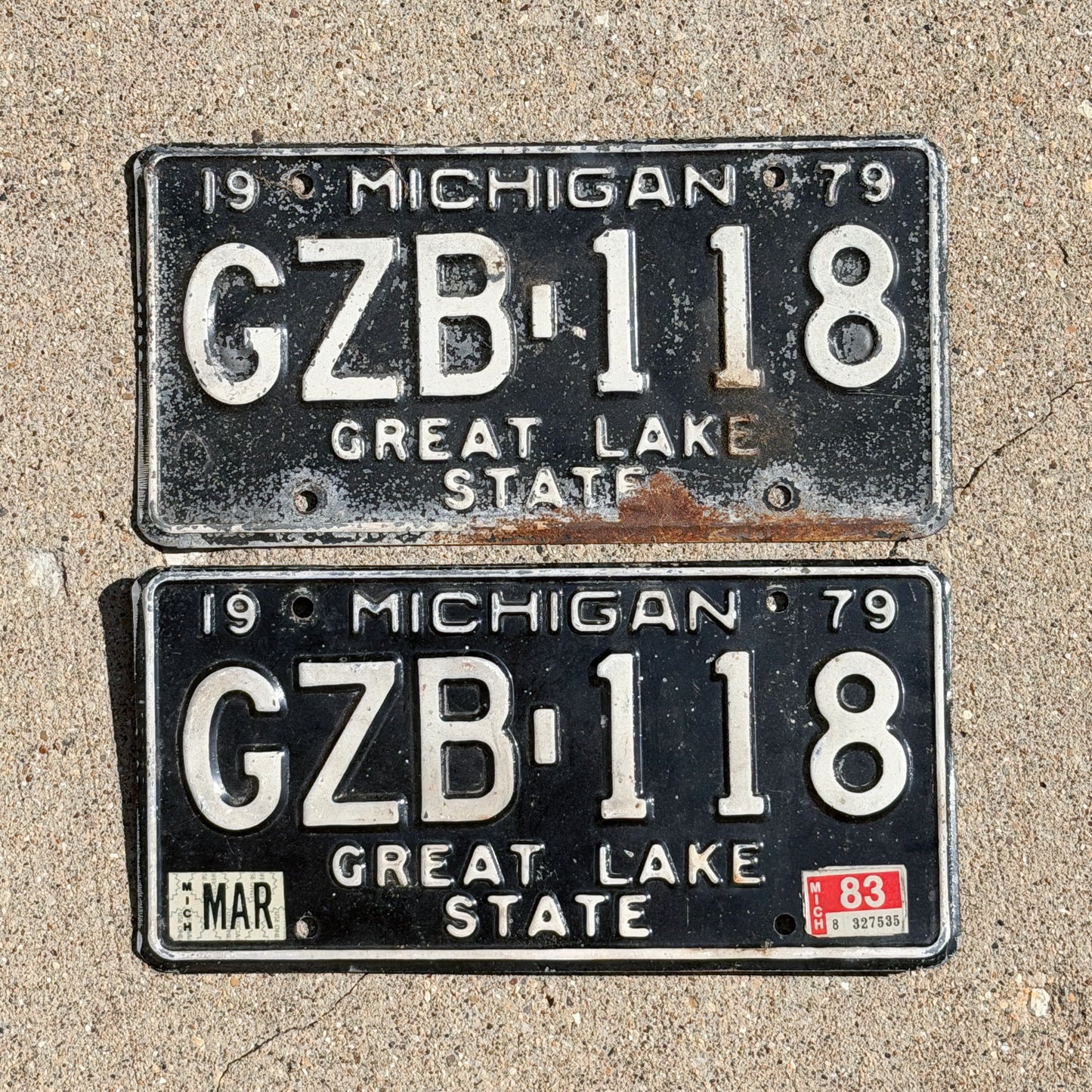 Photo of a 1979 1983 Michigan License Plate Pair Auto Tag Garage Decor Vintage GZB 118 with original patina