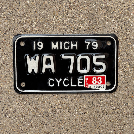 Photo of a 1979 1983 Michigan Motorcycle License Plate Auto Tag Garage Decor Vintage WA 705 with original patina