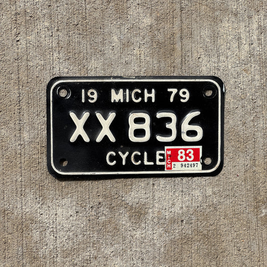Photo of a 1979 1983 Michigan Motorcycle License Plate Auto Tag Garage Decor Vintage XX 836 with original patina