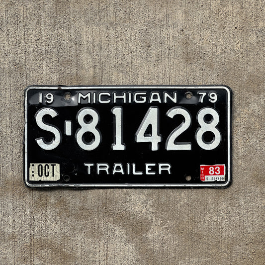 Photo of a 1979 1983 Michigan Trailer License Plate Auto Tag Garage Decor Vintage S 81428 with original patina