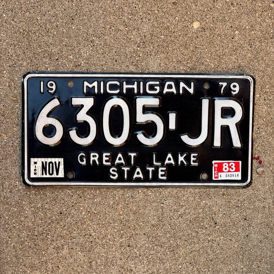 Photo of a 1979 1983 Michigan Truck License Plate Auto Tag Garage Decor Vintage 6305 JR