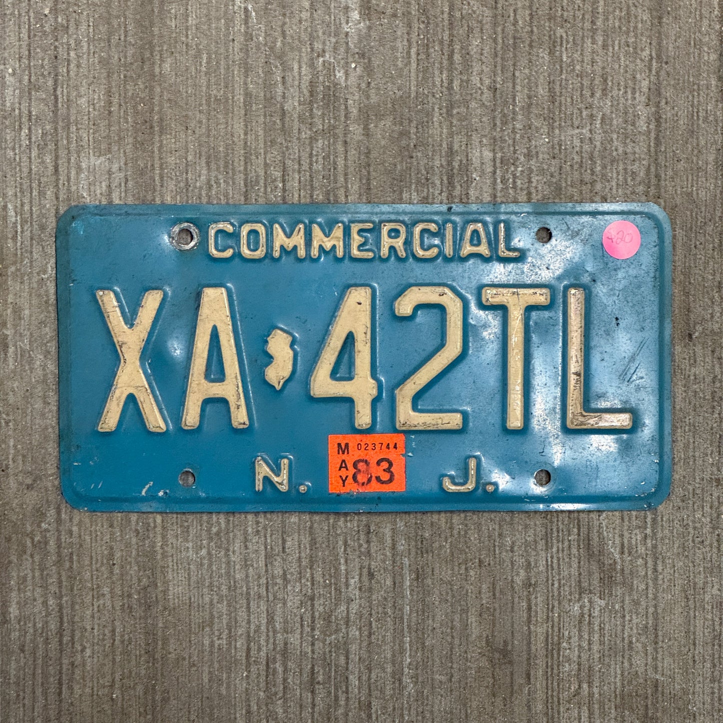 Photo of a 1979 1983 New Jersey Commercial License Plate Auto Tag Garage Decor Vintage Light Blue XA 42 TL with original patina