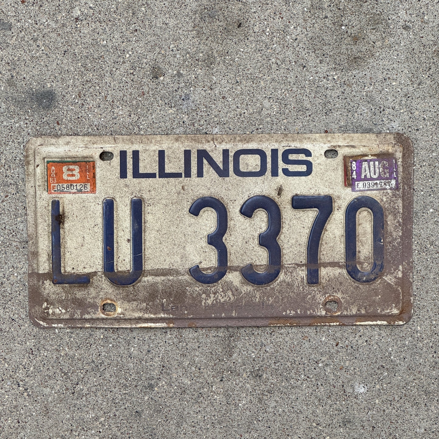 Photo of a 1979 1984 Illinois License Plate Auto Tag Garage Decor Vintage LU 3370 with original patina