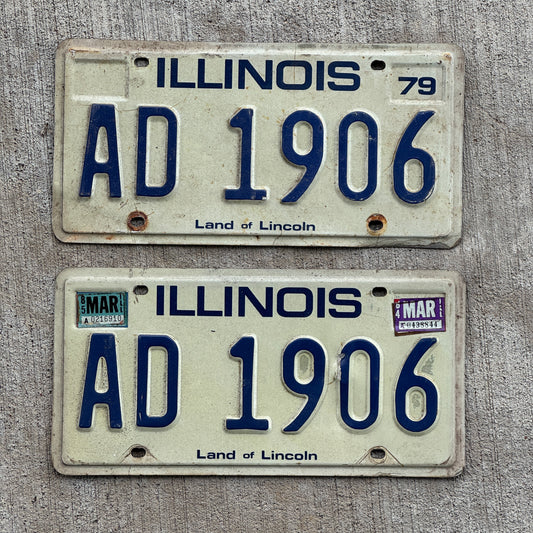Photo of a 1979 1985 Illinois License Plate Pair Auto Tag Garage Decor Vintage AD 1906 with original patina