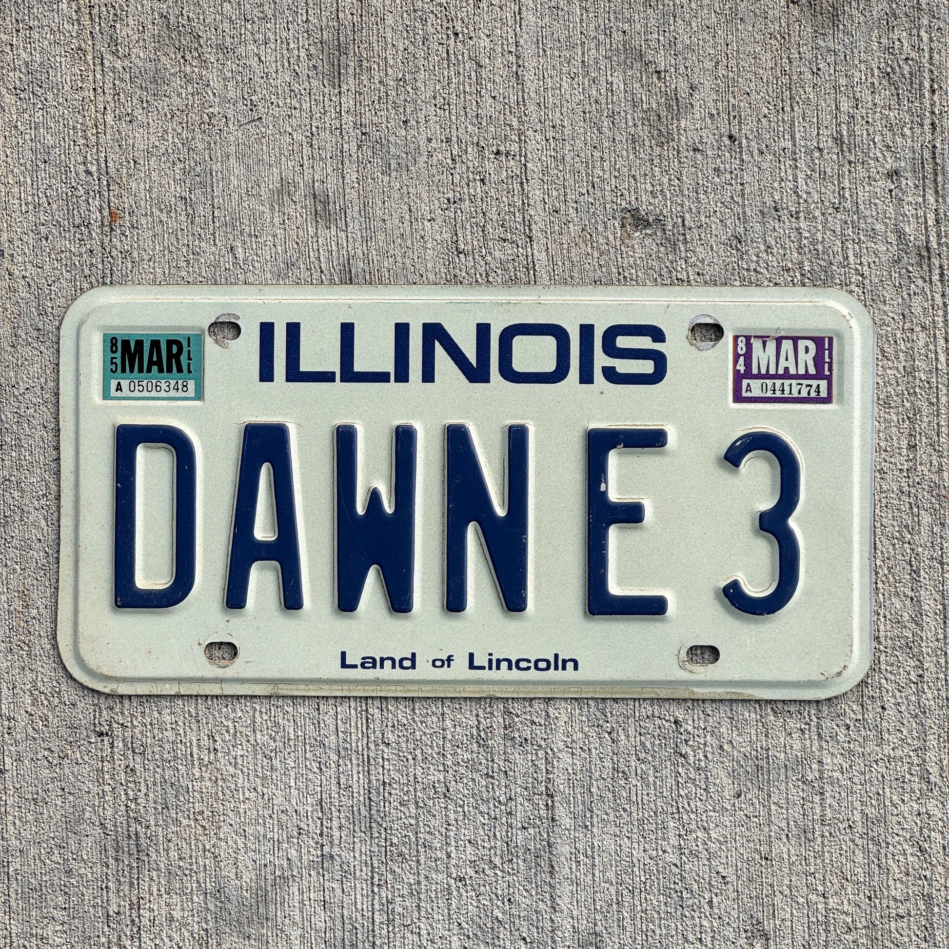 Photo of a 1979 1985 Illinois Vanity License Plate Auto Tag Garage Decor Vintage DAWN E 3 with original patina