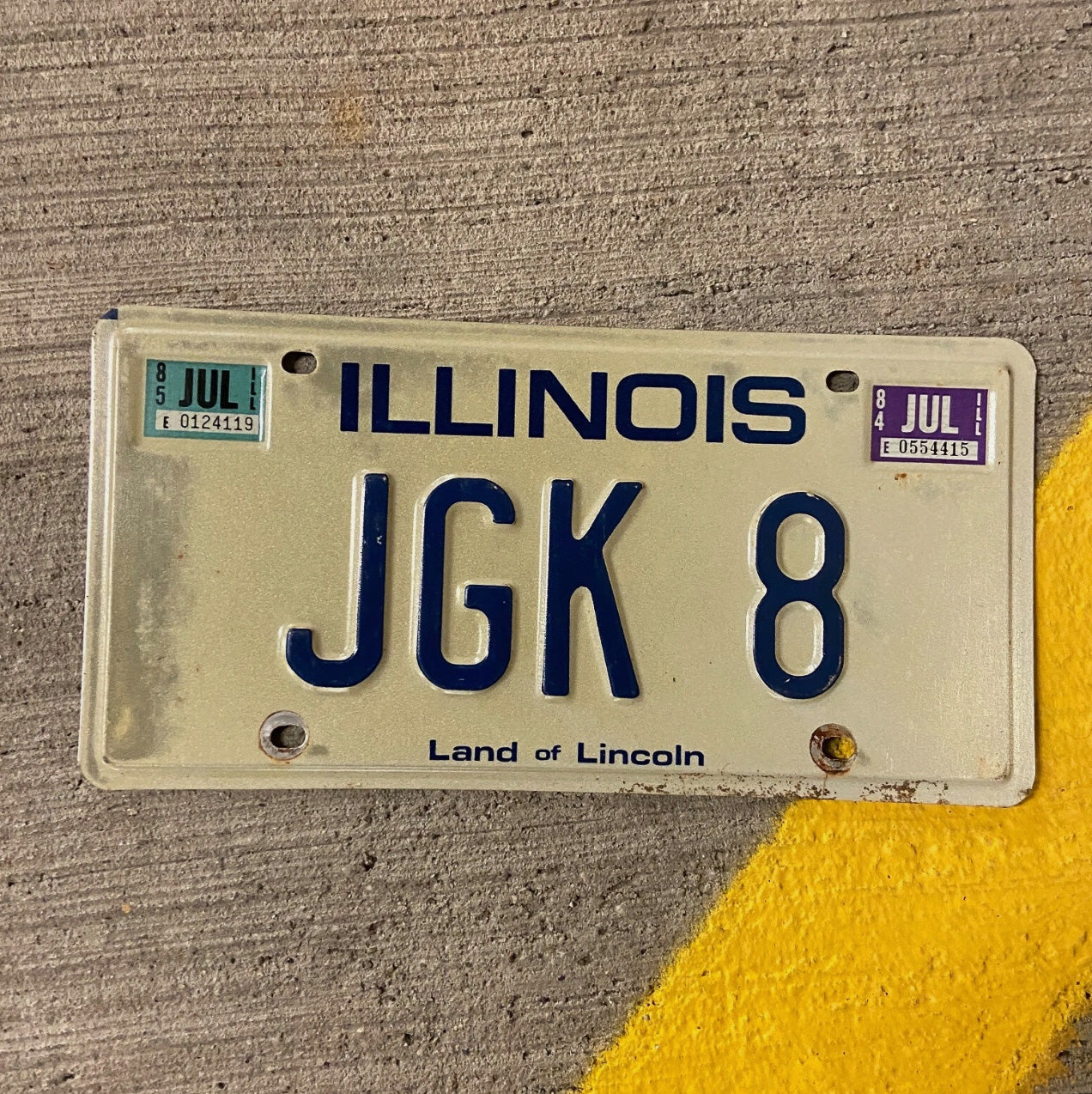 Photo of a 1979 1985 Illinois Vanity License Plate Auto Tag Garage Decor Vintage JGK 8 with original patina