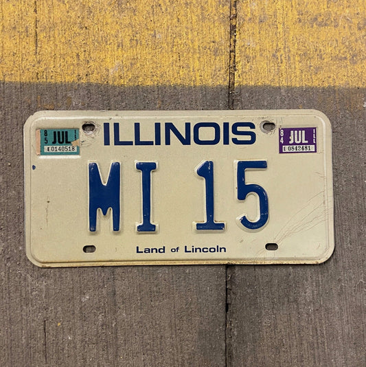 Photo of a 1979 1985 Illinois Vanity License Plate Auto Tag Garage Decor Vintage MI 15 with original patina