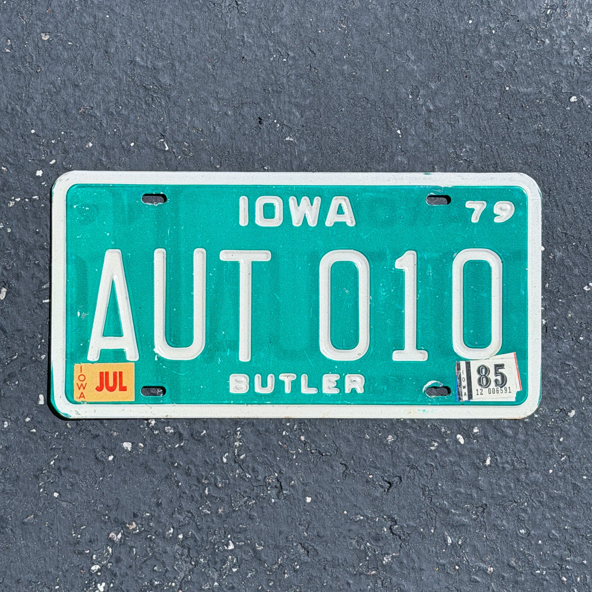 Photo of a 1979 1985 Iowa License Plate Auto Tag Garage Decor Vintage AUT 010 with original patina