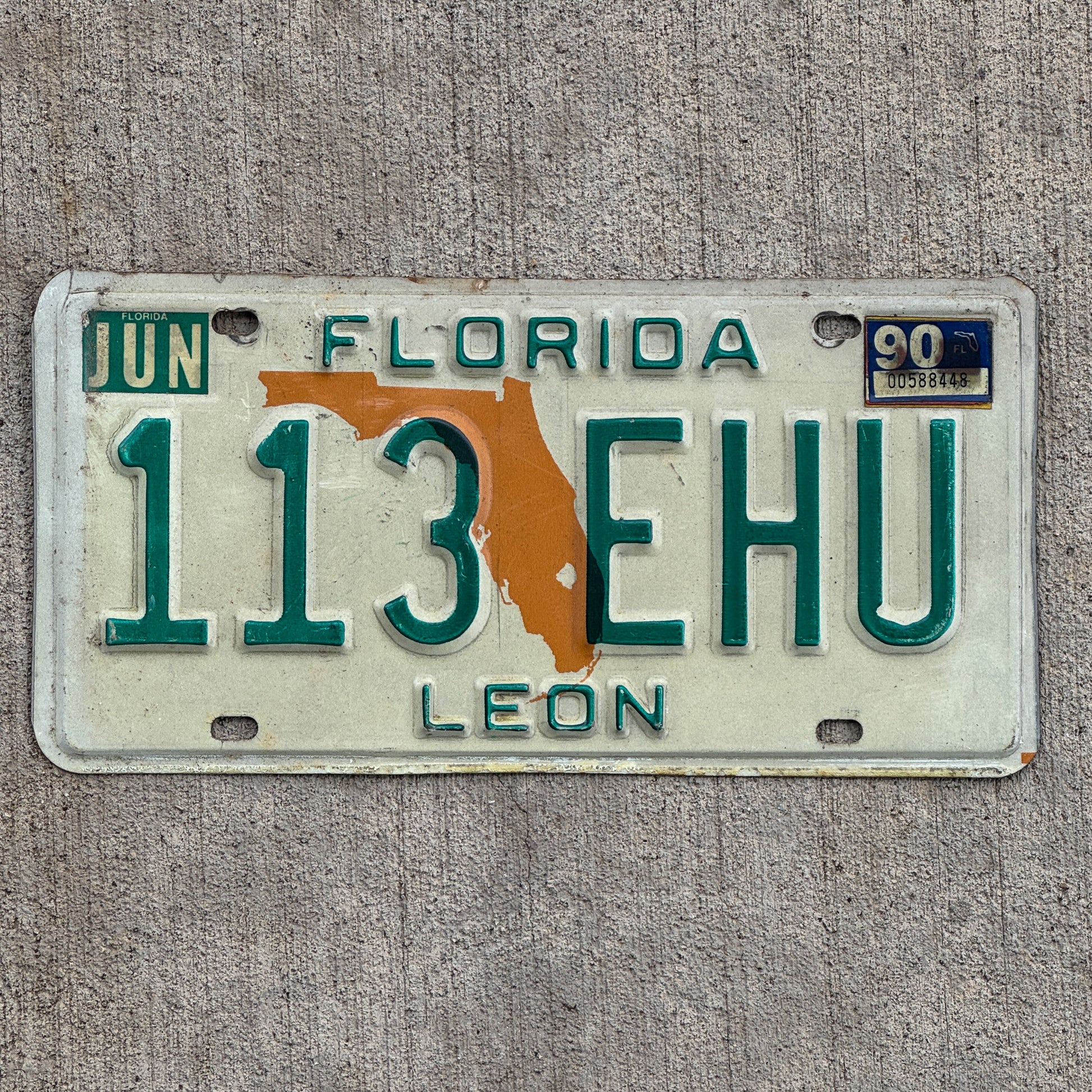 Photo of a 1979 1990 Florida License Plate Auto Tag Garage Decor Vintage 113 EHU with original patina