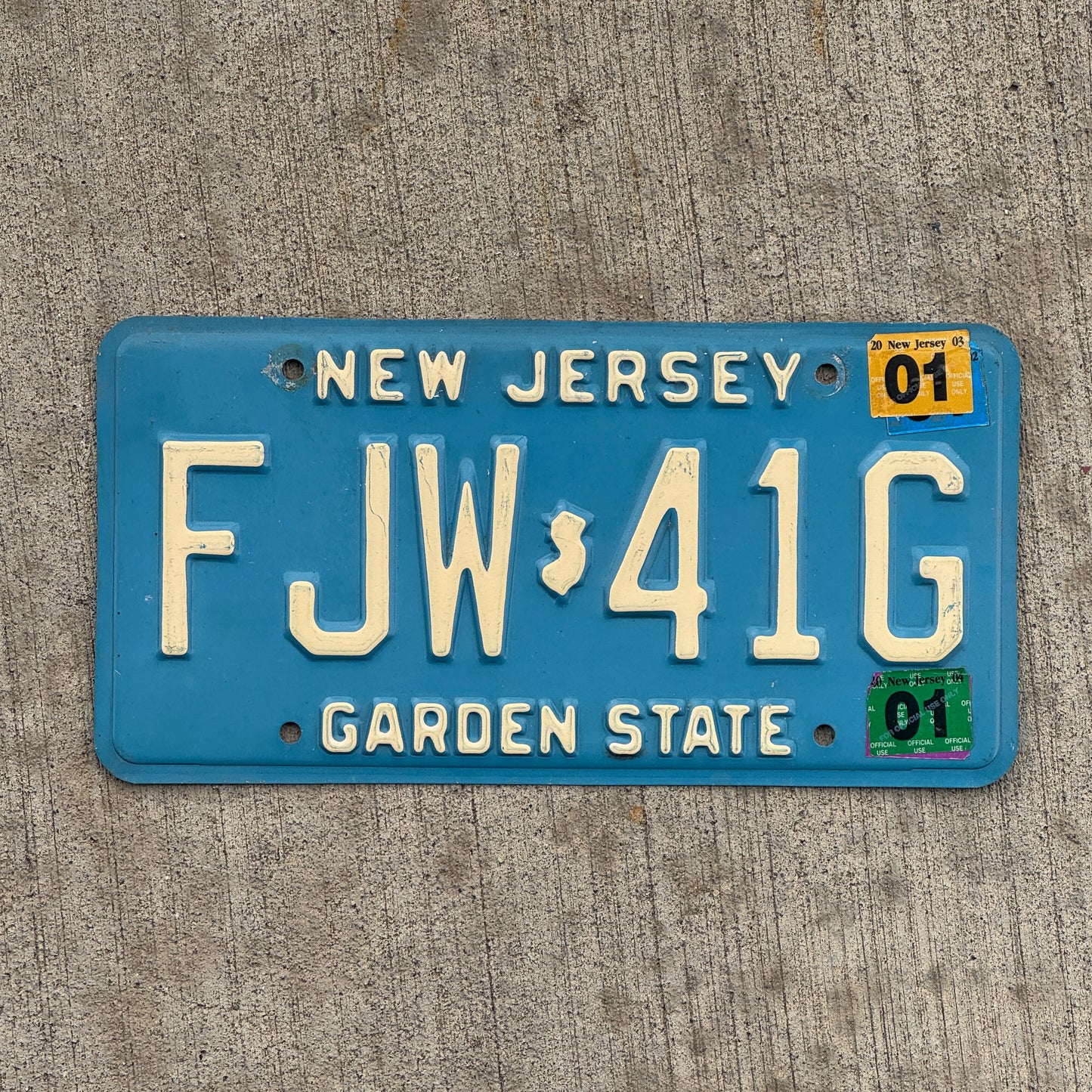 Photo of a 1979 2001 New Jersey License Plate Auto Tag 1 Vintage Garage Blue FJW 41G with original patina