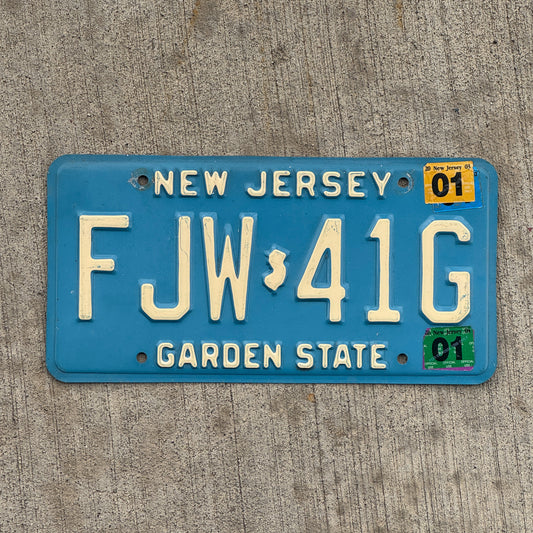 Photo of a 1979 2001 New Jersey License Plate Auto Tag 1 Vintage Garage Blue FJW 41G with original patina