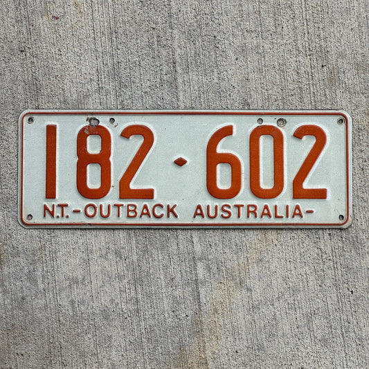 Photo of a 1979 Australia License Plate Auto Tag Garage Decor Vintage Northern Territory Outback 182 602 with original patina