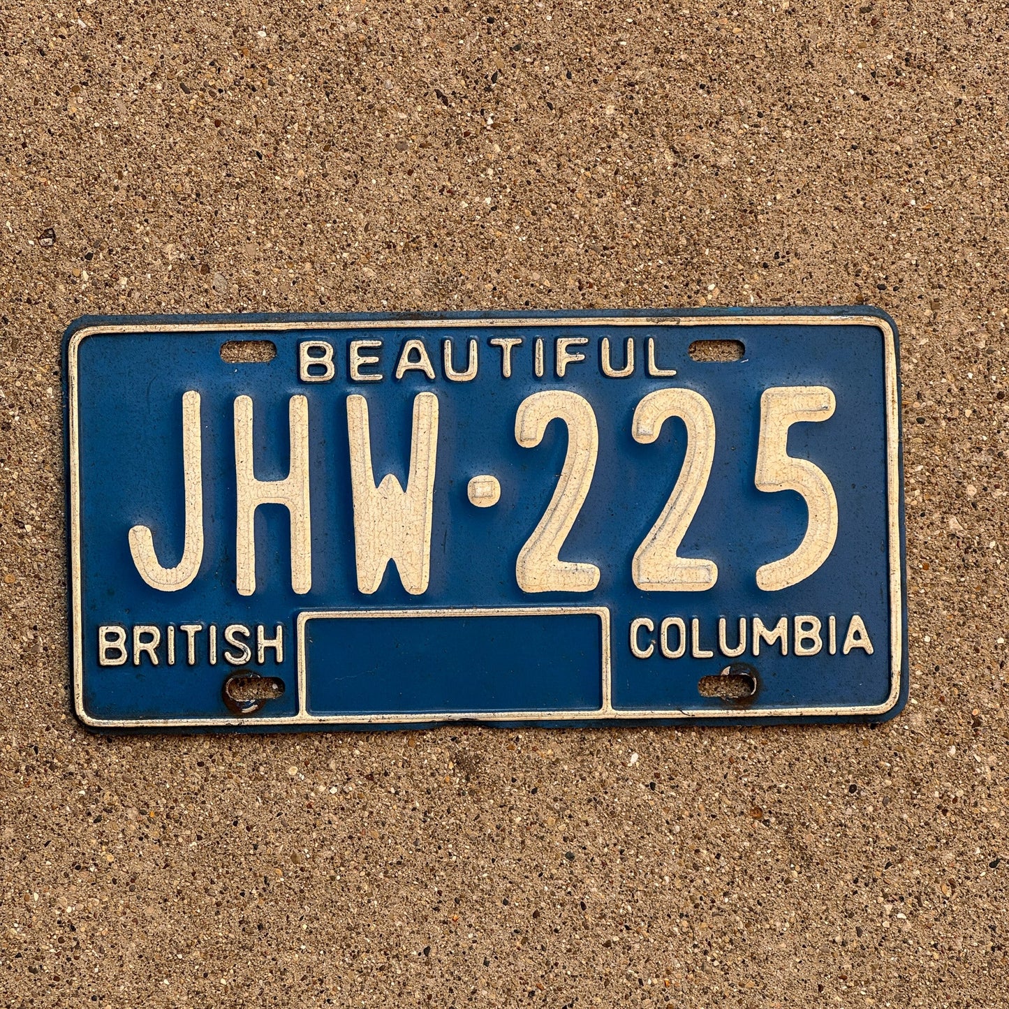 Photo of a 1979 British Columbia License Plate Auto Tag Garage Decor Vintage JHW 225