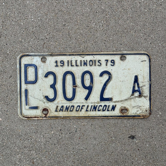 Photo of a 1979 Illinois Dealer License Plate Auto Tag Garage Decor Vintage 3092 A