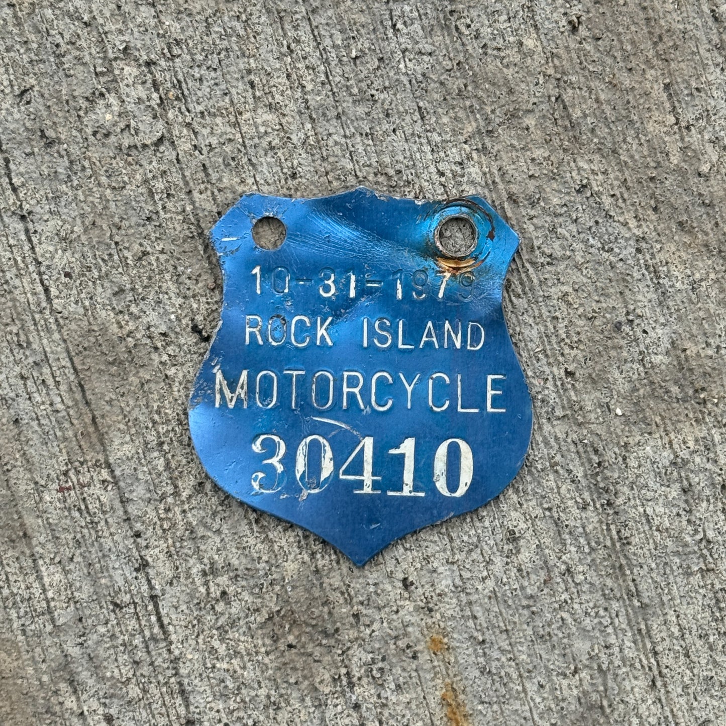 Photo of a 1979 Illinois Motorcycle Tax Tag License Plate Auto Tag Garage Decor Vintage Badge 30410 with original patina