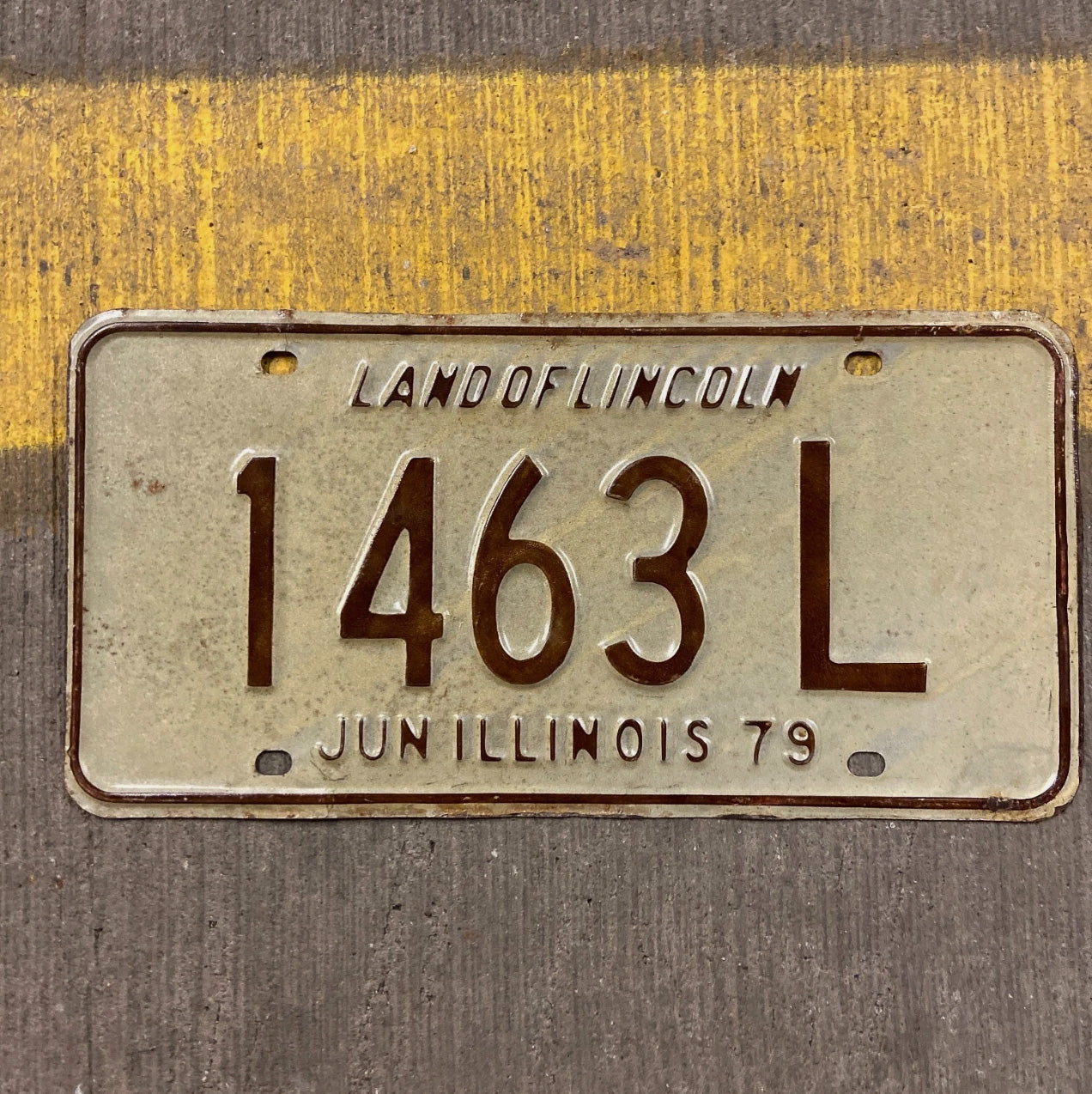 Photo of a 1979 Illinois Truck License Plate Auto Tag Garage Decor Vintage 1463 L with original patina