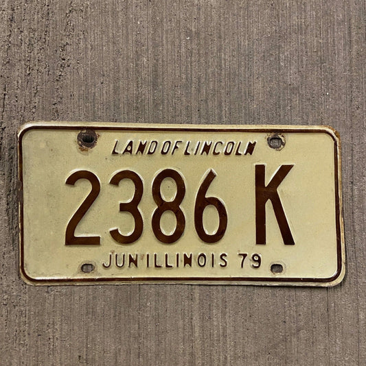 Photo of a 1979 Illinois Truck License Plate Auto Tag Garage Decor Vintage 2386 K with original patina