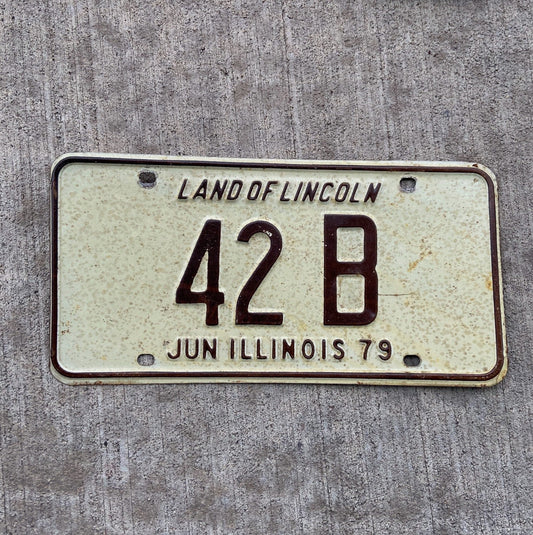 Photo of a 1979 Illinois Truck License Plate Auto Tag Garage Decor Vintage Low Number Two Digit 42 B with original patina