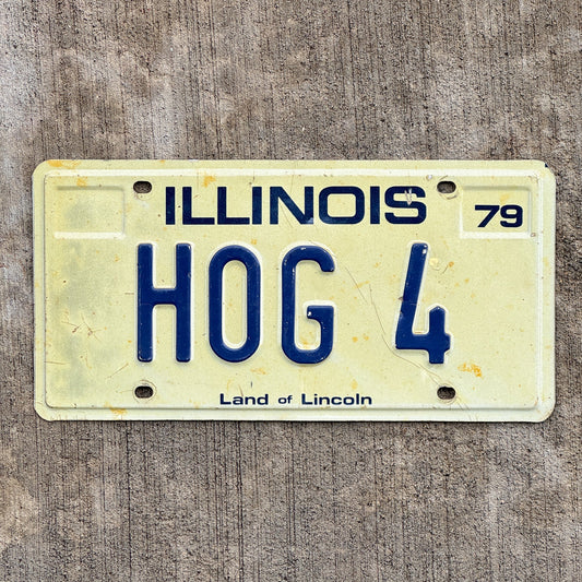 Photo of a 1979 Illinois Vanity License Plate Auto Tag Garage Decor Vintage Harley Motorcycle Enthusiast HOG 4 with original patina