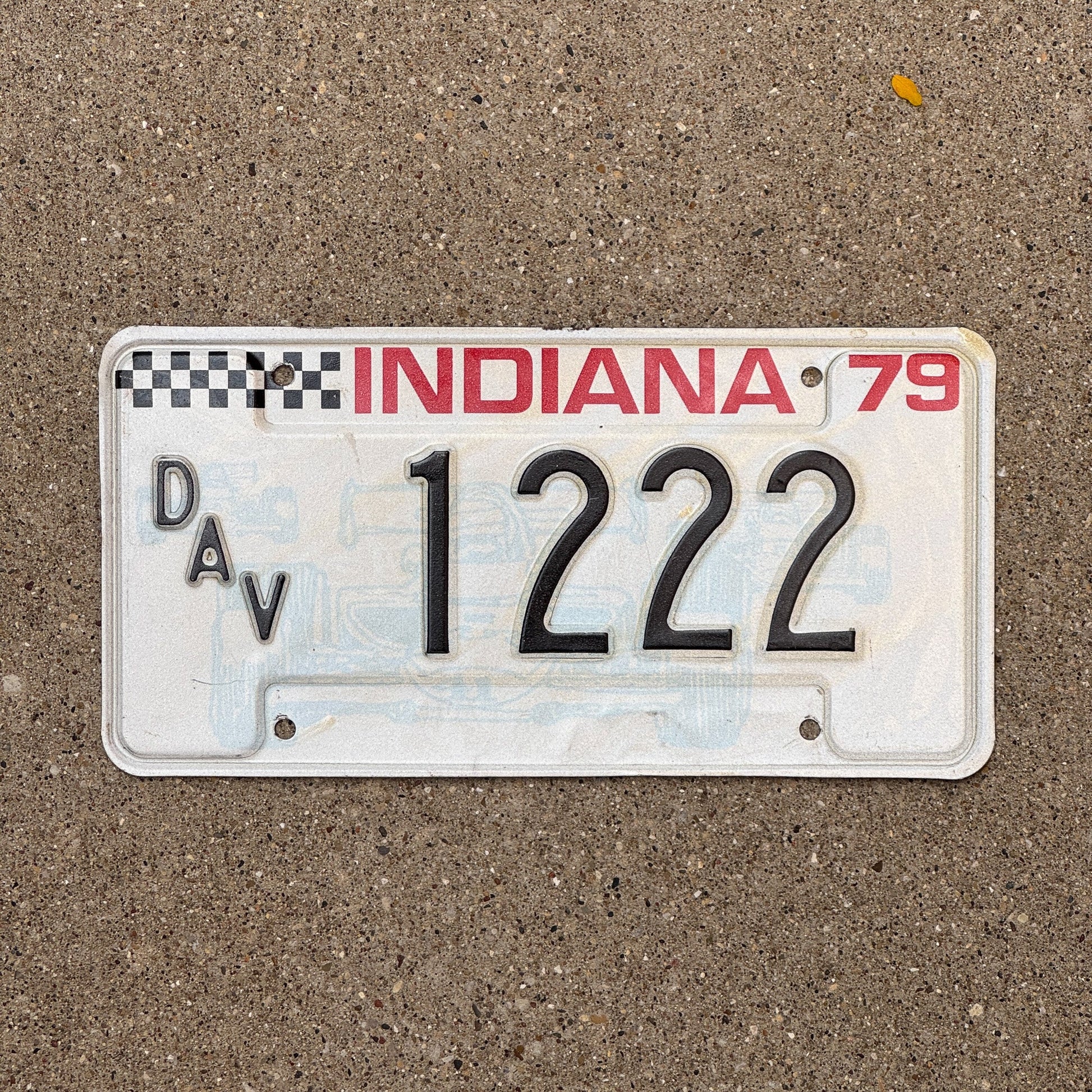 Photo of a 1979 Indiana Disabled Veteran License Plate Auto Tag Garage Decor Vintage DAV Repeat Repeating 1222 with original patina