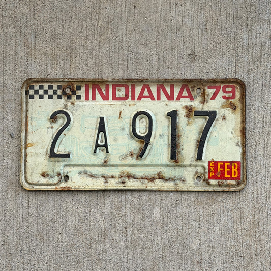 Photo of a 1979 Indiana License Plate Auto Tag Garage Decor Vintage Checkered Race Car 2 A 917 with original patina