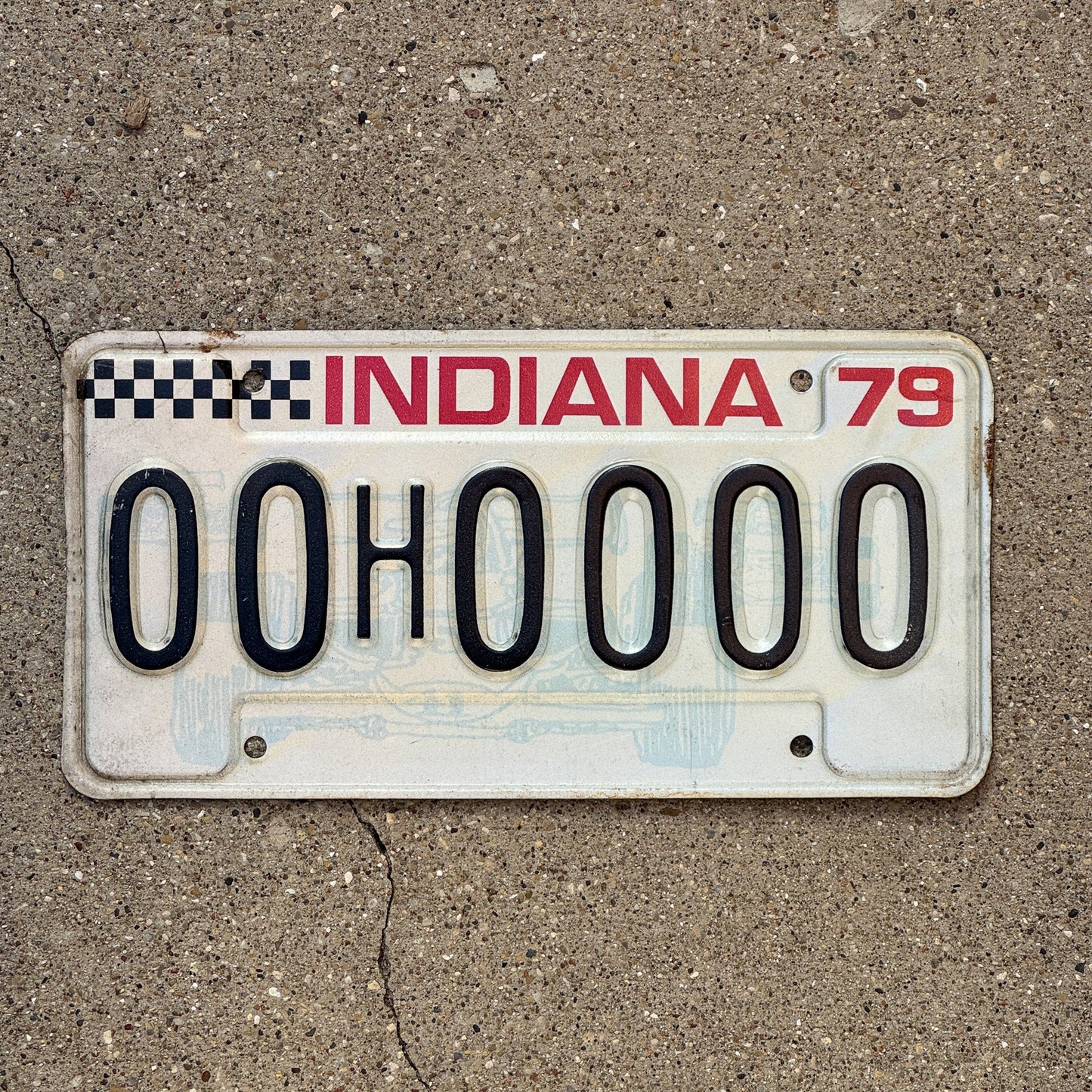 Photo of a 1979 Indiana Sample License Plate Auto Tag 2 Garage Decor 00H0000 with original patina