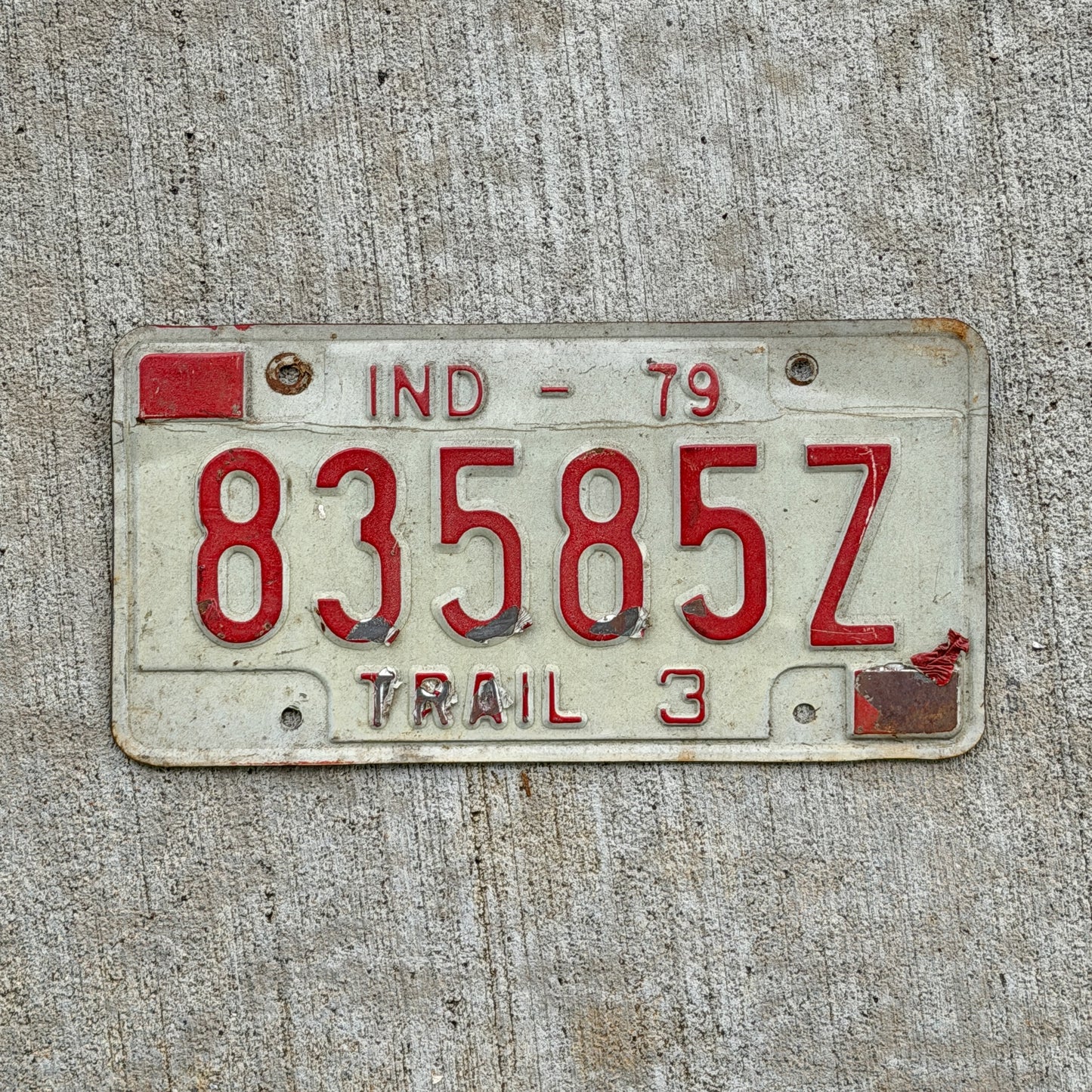 Photo of a 1979 Indiana Trailer License Plate Auto Tag Garage Decor Vintage 83585 Z with original patina