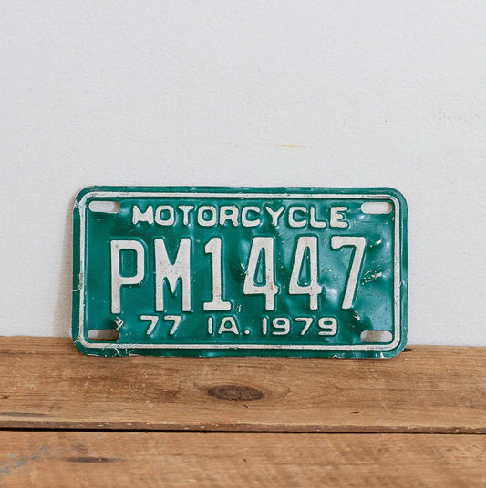 Photo of a 1979 Iowa Motorcycle License Plate Auto Tag Garage Decor Vintage PM 1447 with original patina