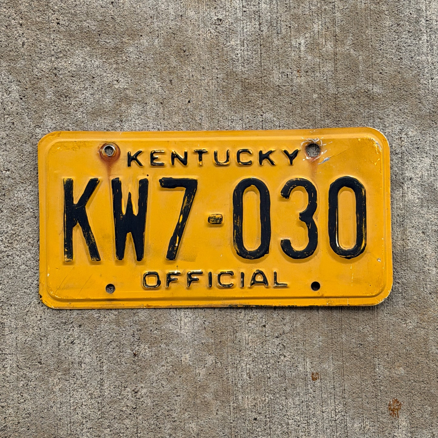 Photo of a 1979 Kentucky Official License Plate Auto Tag Garage Decor Vintage KW 7 030 with original patina