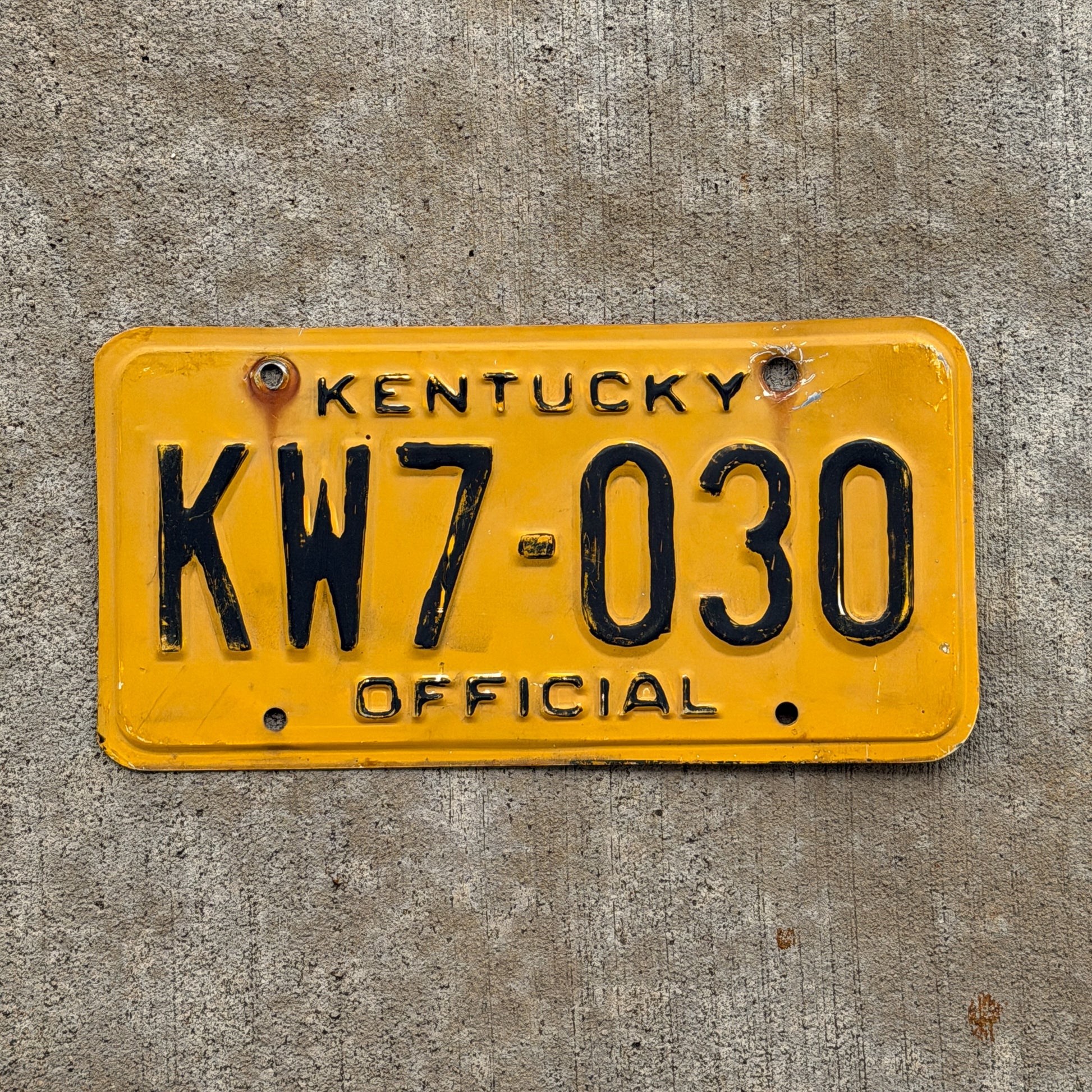 Photo of a 1979 Kentucky Official License Plate Auto Tag Garage Decor Vintage KW 7 030 with original patina