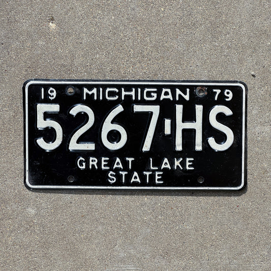 Photo of a 1979 Michigan Commercial License Plate Auto Tag Garage Decor Vintage 5267 HS with original patina