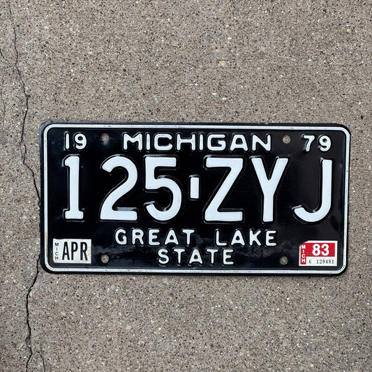 Photo of a 1979 Michigan License Plate Auto Tag Garage Decor Vintage Black White 125 ZYJ