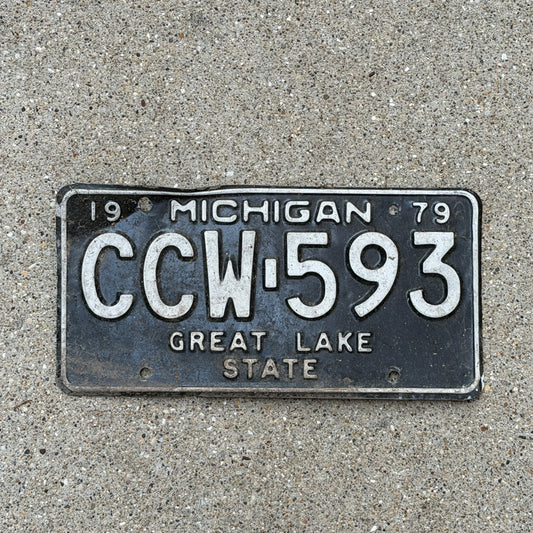 Photo of a 1979 Michigan License Plate Auto Tag Garage Decor Vintage CCW 593 with original patina