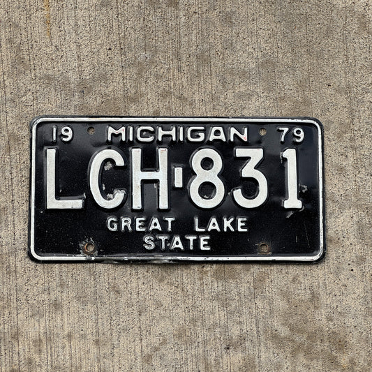 Photo of a 1979 Michigan License Plate Auto Tag Garage Decor Vintage LCH 831 with original patina
