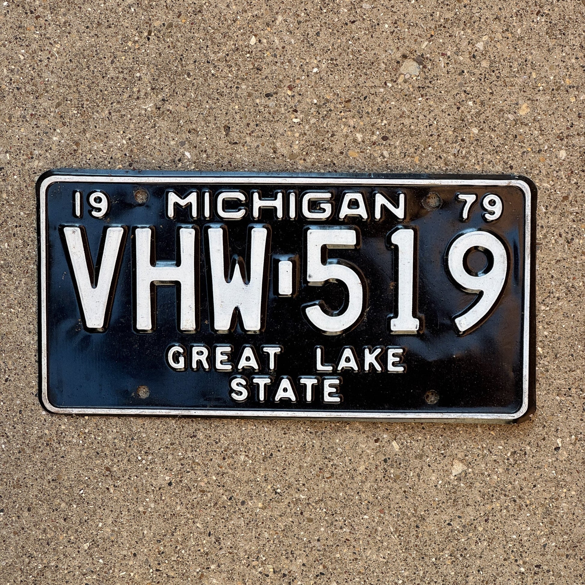 Photo of a 1979 Michigan License Plate Auto Tag Garage Decor Vintage VHW 519