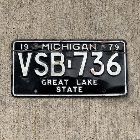 Photo of a 1979 Michigan License Plate Auto Tag Garage Decor Vintage VSB 736 with original patina