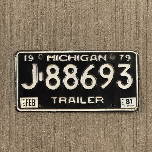 Photo of a 1979 Michigan Trailer License Plate Auto Tag Garage Decor Vintage J 88693