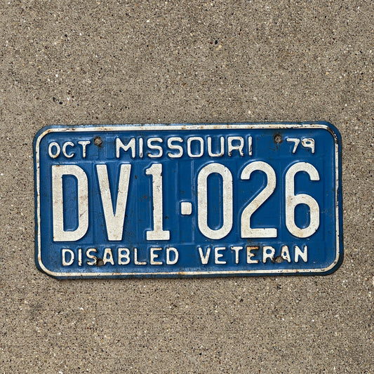 Photo of a 1979 Missouri Disabled Veteran License Plate Auto Tag Garage Decor Vintage Military DV 1026