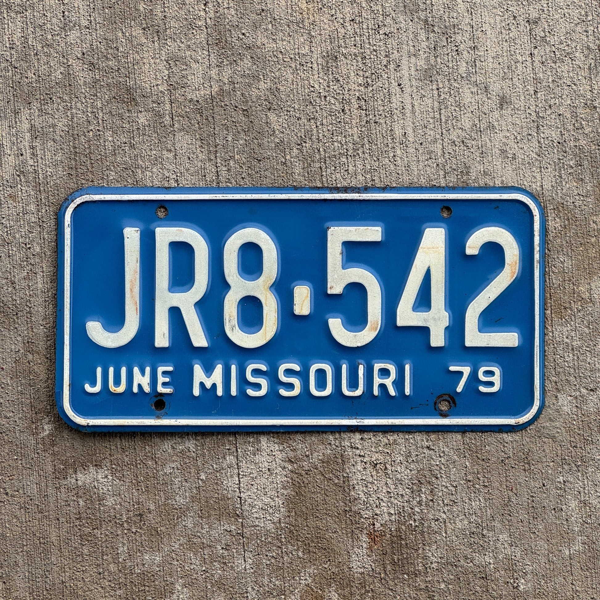 Photo of a 1979 Missouri License Plate Auto Tag Garage Decor Vintage JR8 542 with original patina