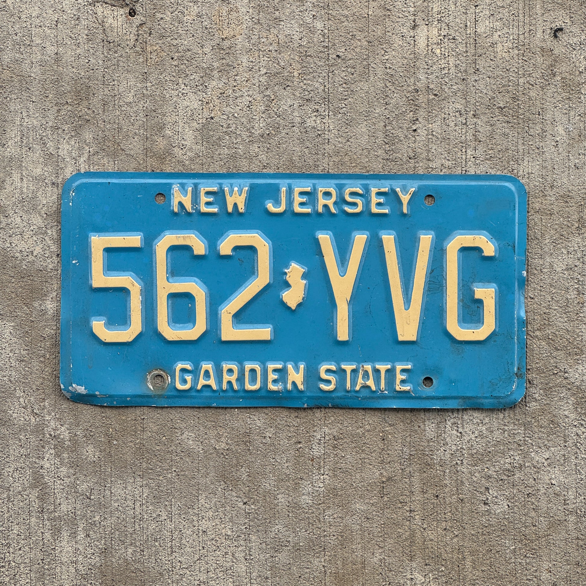 Photo of a 1979 New Jersey License Plate Auto Tag 1 Vintage Garage Blue 562 YVG with original patina