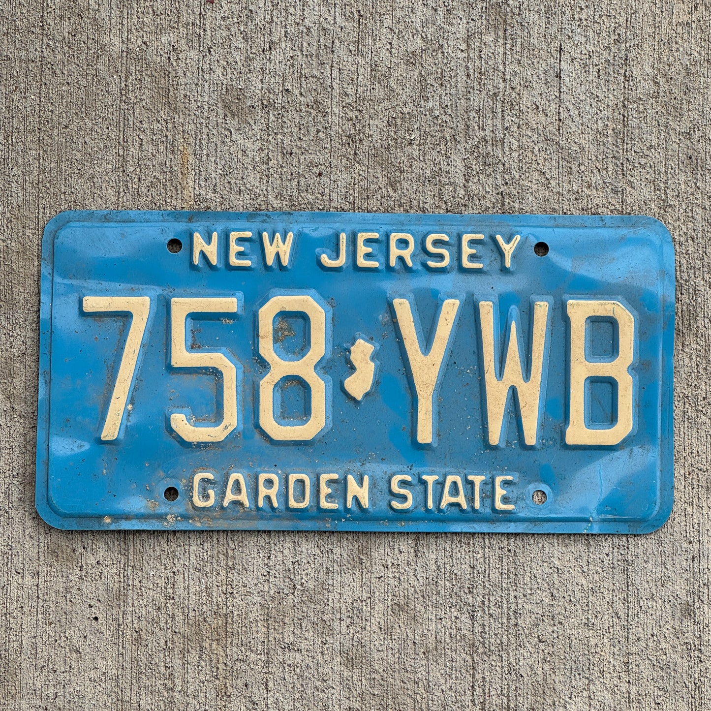 Photo of a 1979 New Jersey License Plate Auto Tag Garage Decor Vintage 758 YWB with original patina