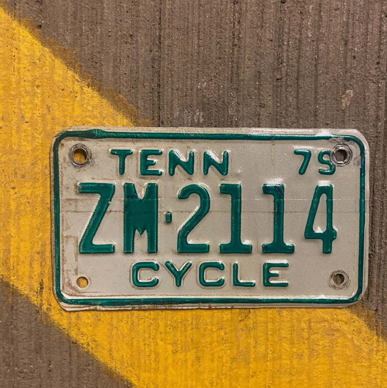 Photo of a 1979 Tennessee Motorcycle License Plate Auto Tag Garage Decor Vintage ZM 2114 with original patina