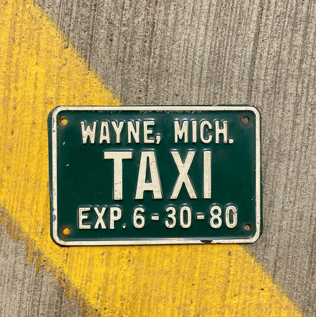 Photo of a 1980 1980 Michigan Taxi License Plate Auto Tag Garage Decor Vintage Small Size Wayne TAXI with original patina