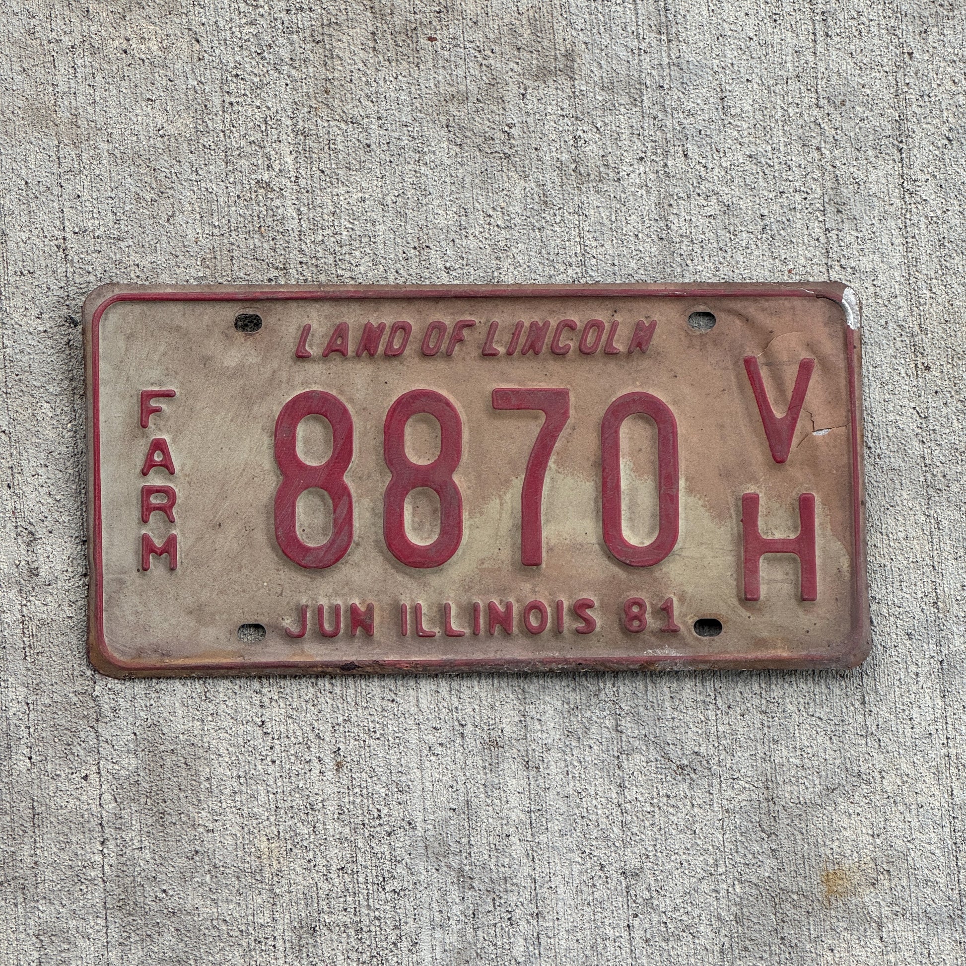 Photo of a 1980 1981 Illinois Farm License Plate Auto Tag Garage Decor Vintage 8870 VH with original patina