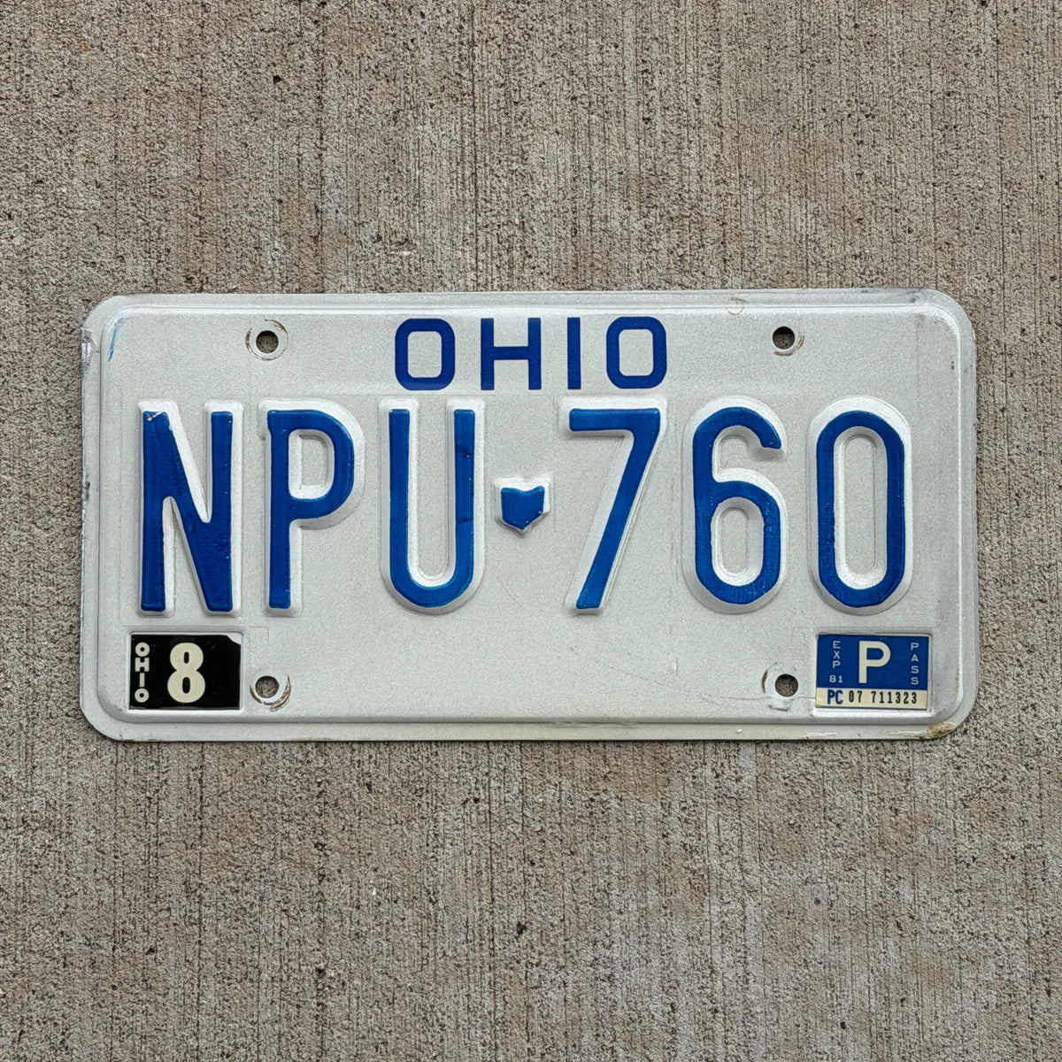Photo of a 1980 1981 Ohio License Plate Auto Tag Garage Decor Vintage NPU 760 with original patina