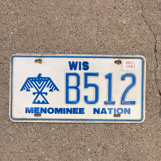 Photo of a 1980 1982 Wisconsin Menominee Nation License Plate Auto Tag Garage Decor Vintage Native American Indian Tribe B 512 with original patina