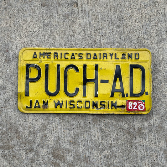 Photo of a 1980 1982 Wisconsin Vanity License Plate Auto Tag 1 Vintage Garage PUCH AD with original patina