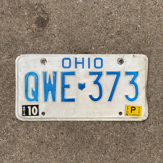 Photo of a 1980 1983 Ohio License Plate Auto Tag 1 Vintage Garage QWE 373 with original patina