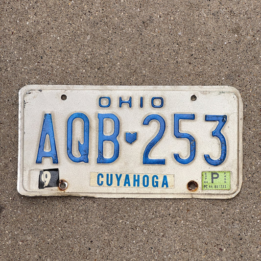 Photo of a 1980 1984 Ohio License Plate Auto Tag Garage Decor Vintage AQB 253 with original patina